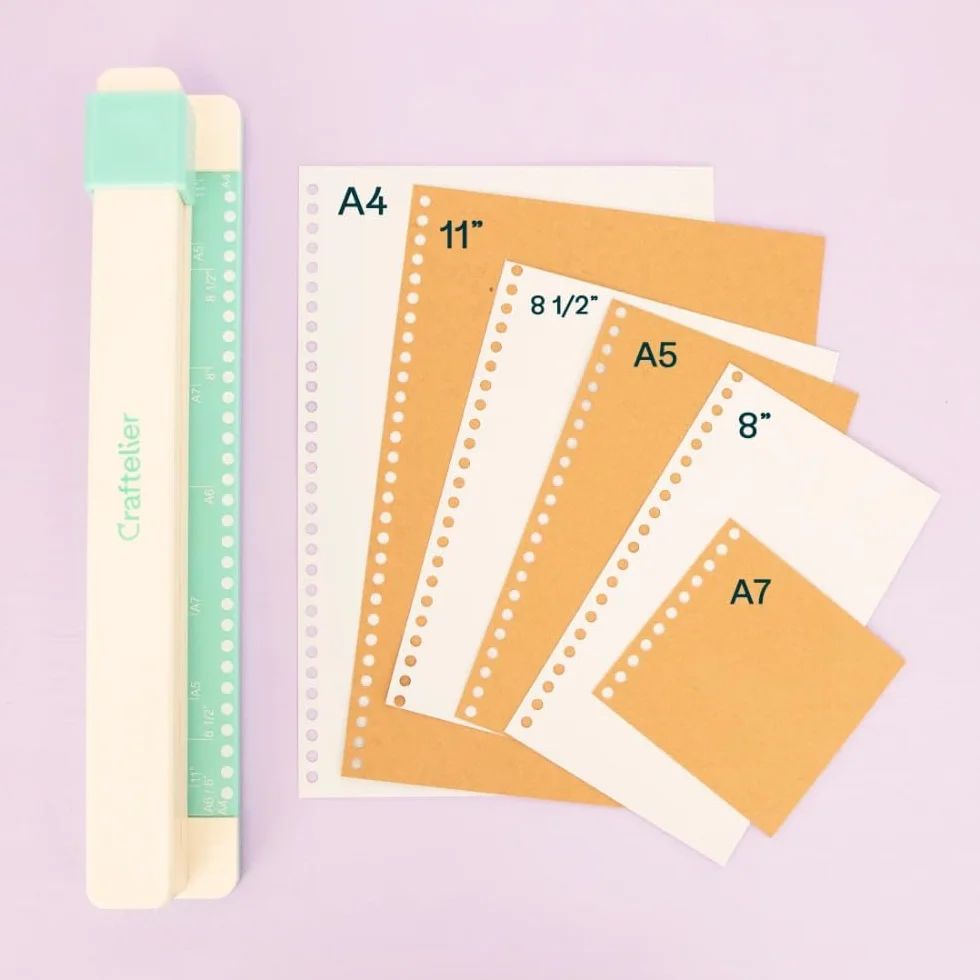 Craftelier - Encuadernadora Manual de 30 Agujeros - Perforadora con 6 Anillas Tonos Blanco y Negro - Perfora hasta 5 Hojas - Compatible con Tamaños de A4, A5, A6, A7 - Para Cuadernos y Scrapbooking