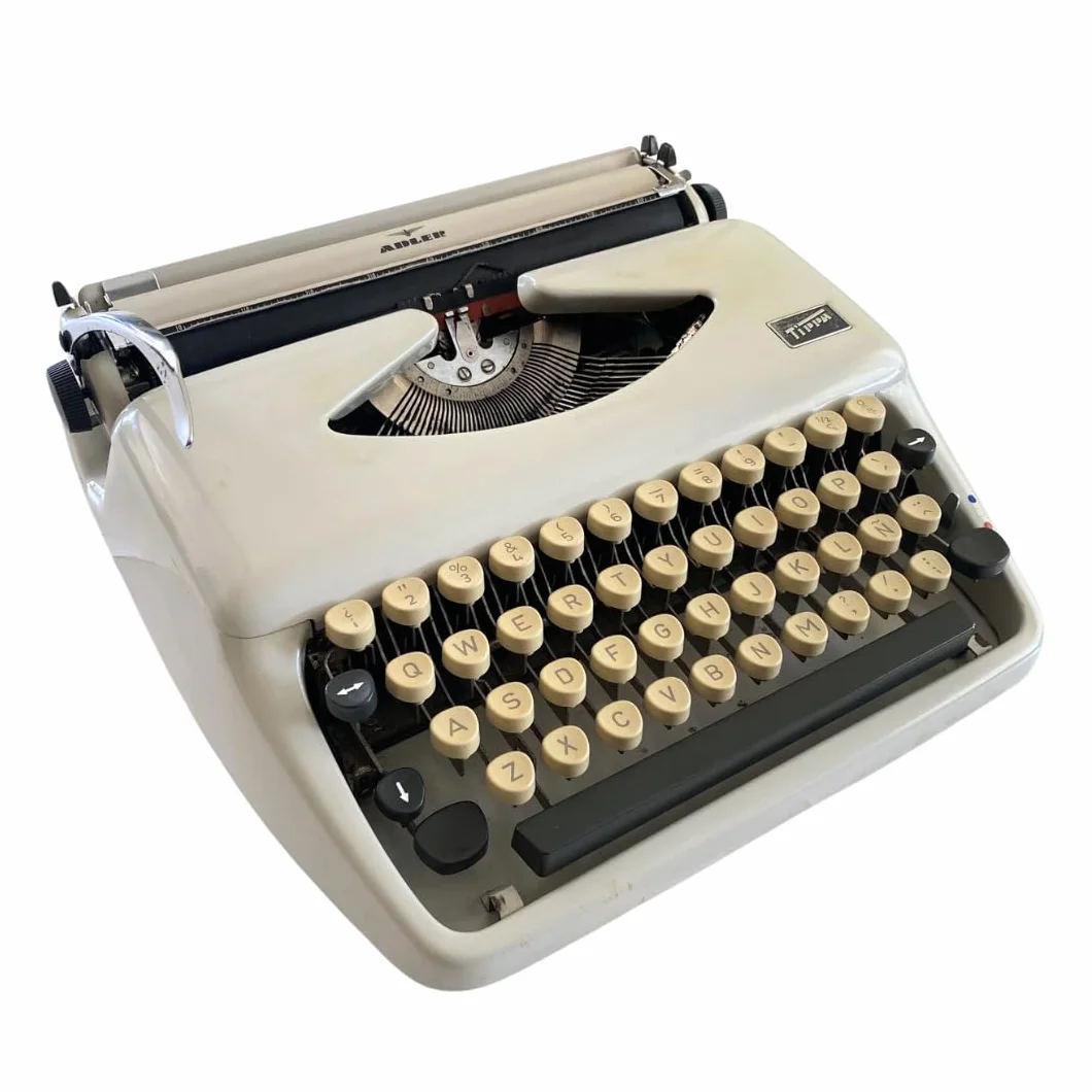 Genérico Máquina de Escribir Vintage Adler Tippa - Teclado QWERTY en Castellano con Letra Ñ - Ideal para Coleccionismo - Totalmente Funcional con Servicio técnico en Buenas Condiciones