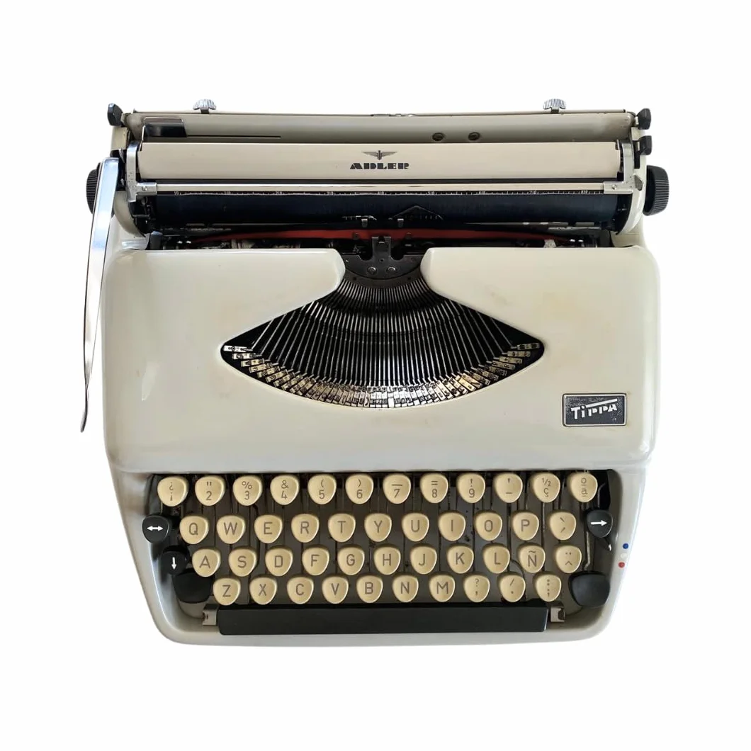 Genérico Máquina de Escribir Vintage Adler Tippa - Teclado QWERTY en Castellano con Letra Ñ - Ideal para Coleccionismo - Totalmente Funcional con Servicio técnico en Buenas Condiciones