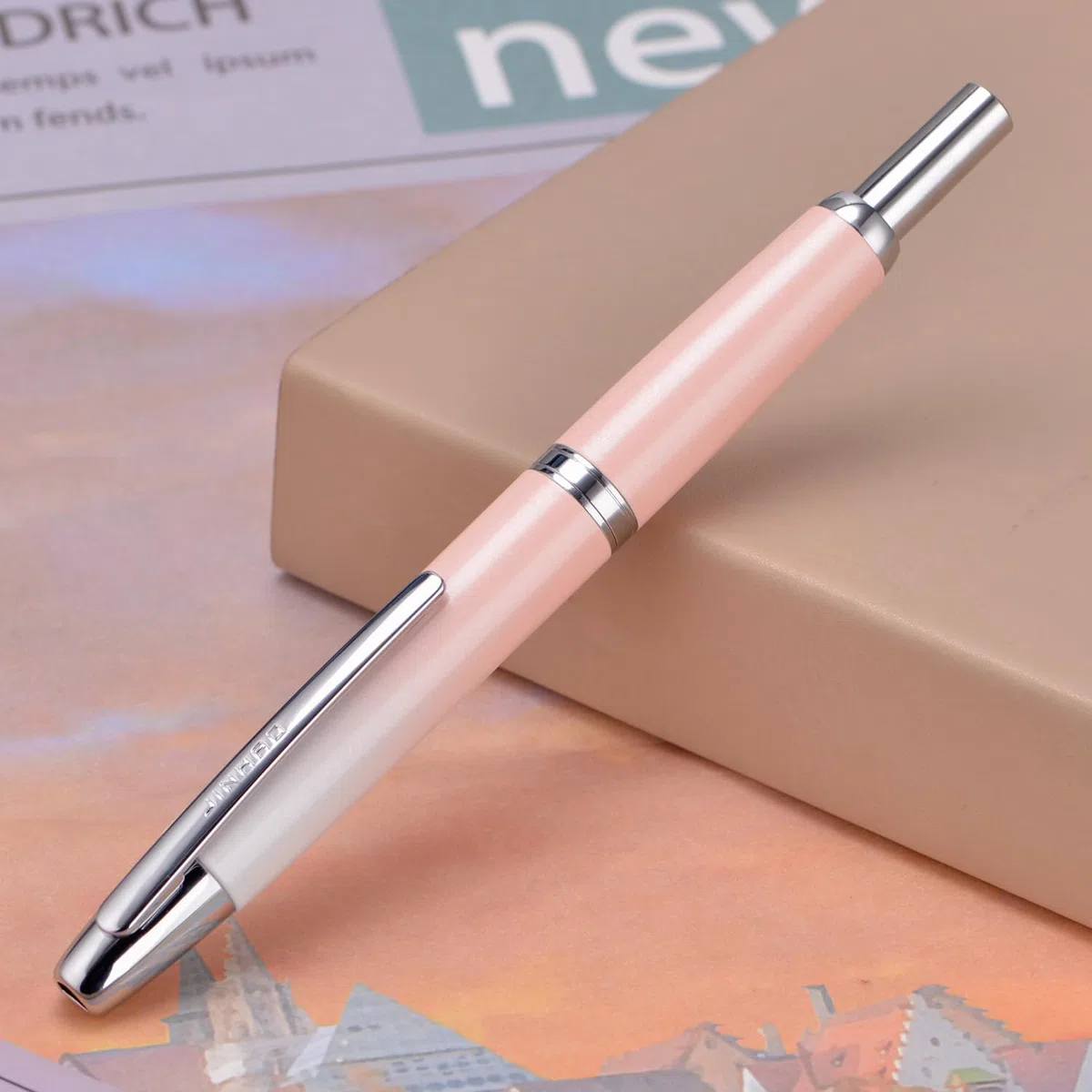 Jinhao 10 - Pluma estilográfica presurizada con caja, punta retráctil mediana en degradado rosa melocotón con conjunto de convertidor de tinta (clip plateado)