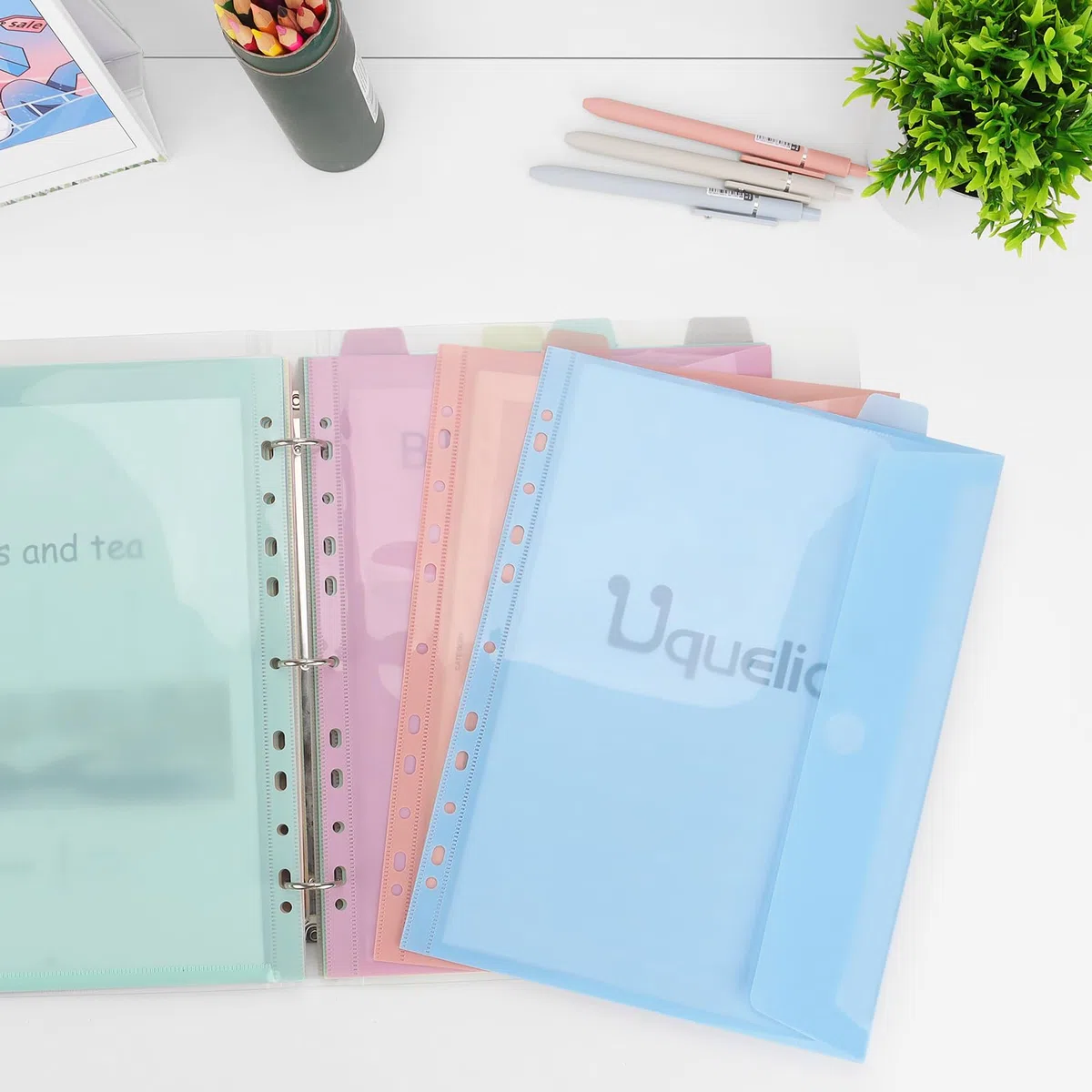Uquelic Carpeta 3 Anillas A4– Carpetas Archivadoras con 12 Fundas Plástico A4 para Organizar y Archivar Documentos (Macarrón Transparente)